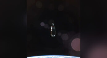 A Japanese space debris inspection satellite maneuvered near an old rocket stage.